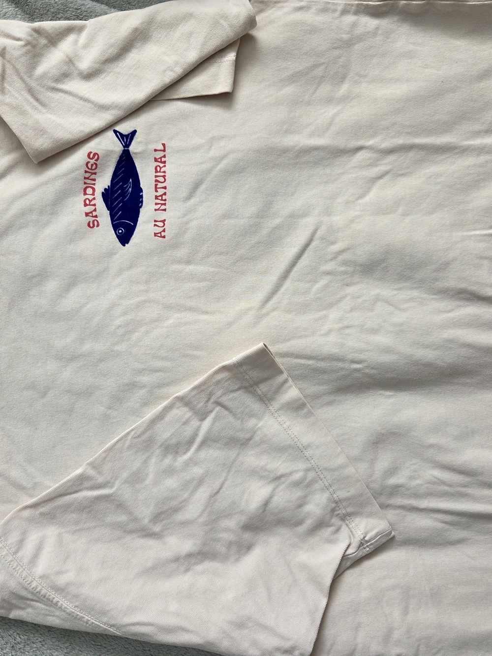 Zara Cream Short Sleeve Tee with Blue Fish Graphic and Red Text